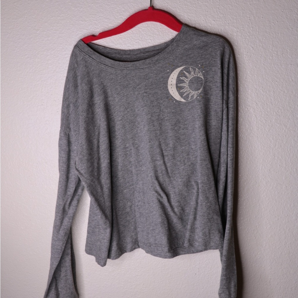 Grey long sleeve top with gold sun moon design